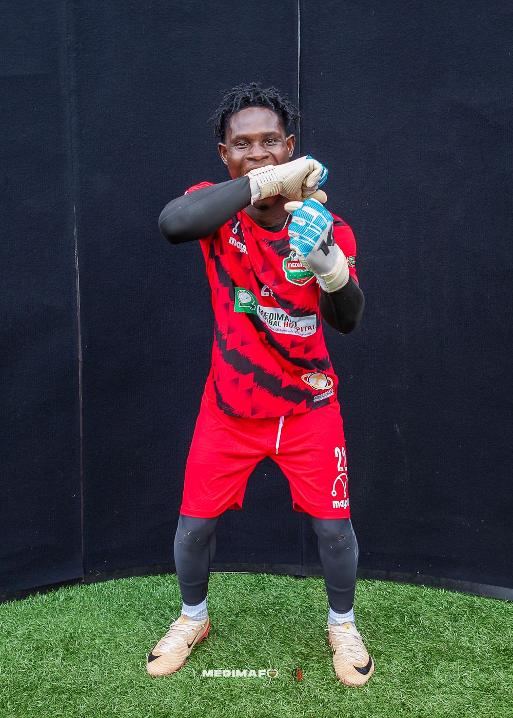 Medimafo Football Academy goalkeeper in the red kit at media day