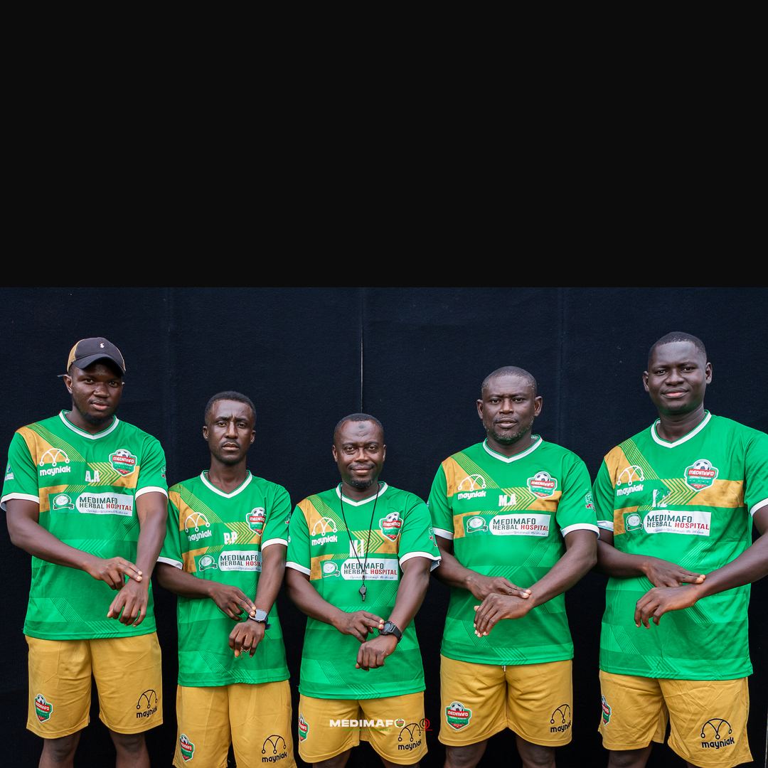 The Medimafo Football Academy coaching staff in the green home kit