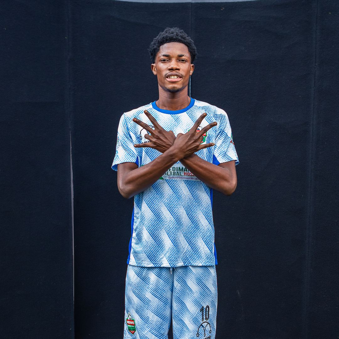Medimafo Football Academy player in the new light blue kit at media day
